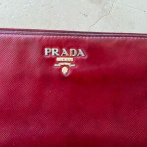 Red Prada wallet- well loved and still going strong